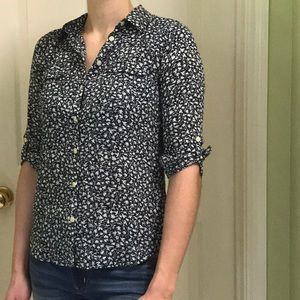 Blue and white floral button down shirt top